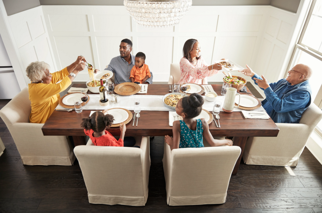 Family enjoying meal | Messina's Flooring
